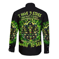 Black long-sleeve button shirt with green flame skull graphic on back