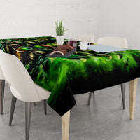 Green and black skull tablecloth with candles and hourglass, side drape