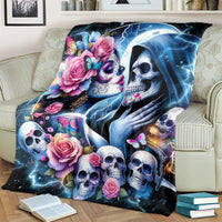 Skull couple blanket on couch, blue glow lightning with roses, butterflies and skull faces
