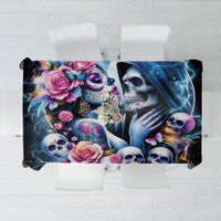 Black skull and rose printed tablecloth, laid flat across two backrests