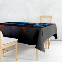 Black tablecloth draped over a rectangular table, blue lightning and skull print.