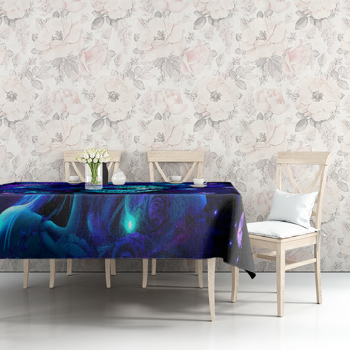Skull-themed tablecloth with blue swirl waves and glowing skull artwork on dark fabric