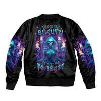 Black bomber jacket with ribbed collar and cuffs, back graphic of blue skull witch
