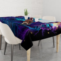 Halloween tablecloth on dining table corner view, black with blue-purple skull graphics