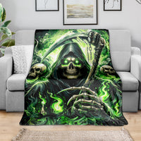 Green flame skull reaper blanket with large central skull, glowing eyes, and skeleton hand