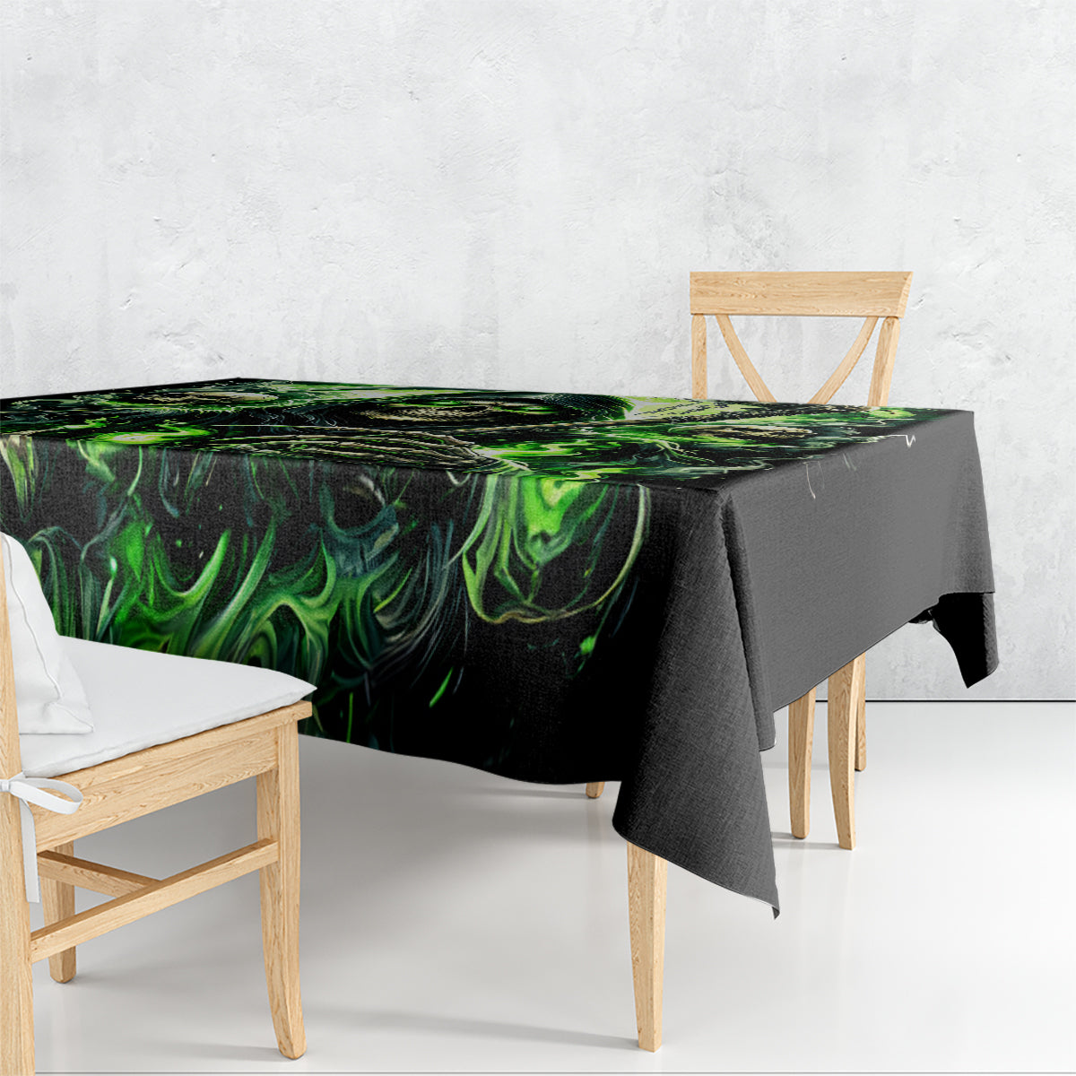 Black tablecloth with green flame and skull design draped over dining table