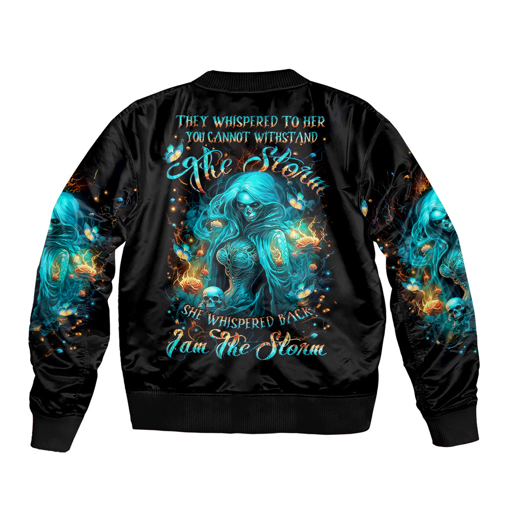 Black bomber jacket with teal witch graphic on back and black ribbed cuffs