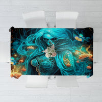 Black tablecloth with teal ghostly skull and swirling flames design