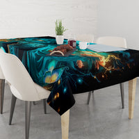 Black tablecloth with teal skull and warm amber flame details, corner drape view