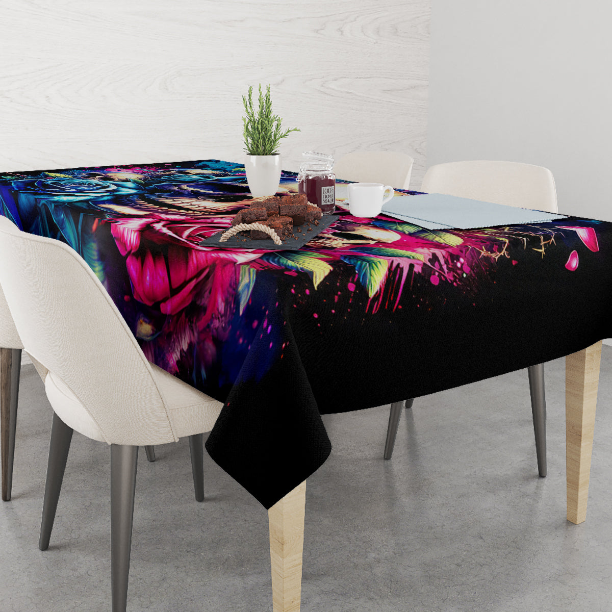 Black tablecloth with colorful skull roses print covering dining table