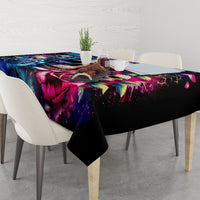 Black tablecloth with colorful skull roses print covering dining table