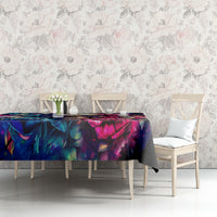 Black tablecloth with vibrant skull and rose graphic on dining table