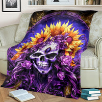 Skull and sunflower blanket with large purple skull and orange sunflowers, dark purple.