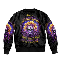 Black unisex bomber jacket with sunflower skull back graphic, ribbed cuffs and hem.