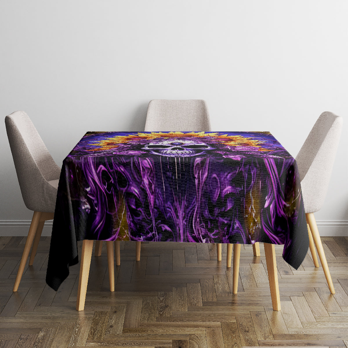 Purple and black skull tablecloth covering a small dining table with chairs