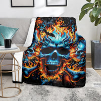 Flame skull blanket on gray floor, blue and orange skull flames on black