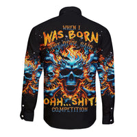 Black long-sleeve button shirt with flaming skull graphic, back view.
