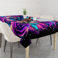 Colorful skull tablecloth with purple and blue swirls, draped over a dining table
