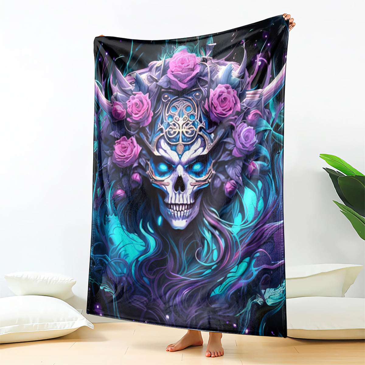 Black skull and rose graphic blanket standing on floor, blue-purple glow with pink roses