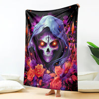 Black blanket featuring hooded skull with roses and warm light dots