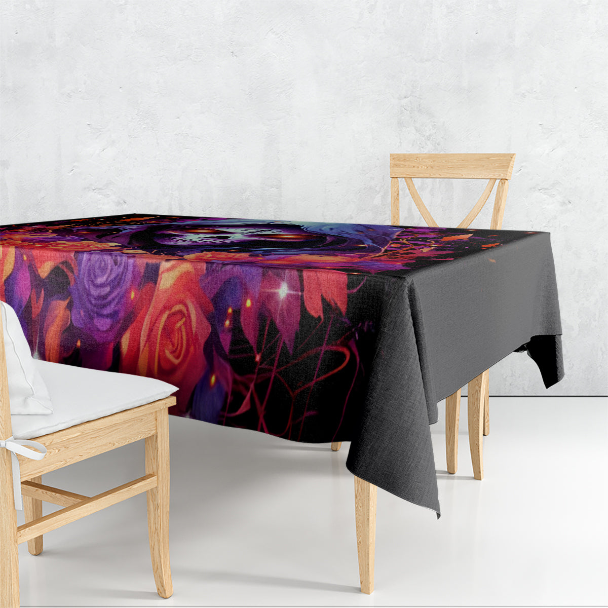 Black skull and rose tablecloth draped over dining bench and table edge