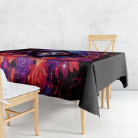 Black skull and rose tablecloth draped over dining bench and table edge