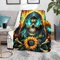 Sunflower skull blanket draped on floor with teal flame hood and bright sunflower