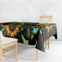Sunflower skull tablecloth draped over table with dark teal leaf and butterfly motifs