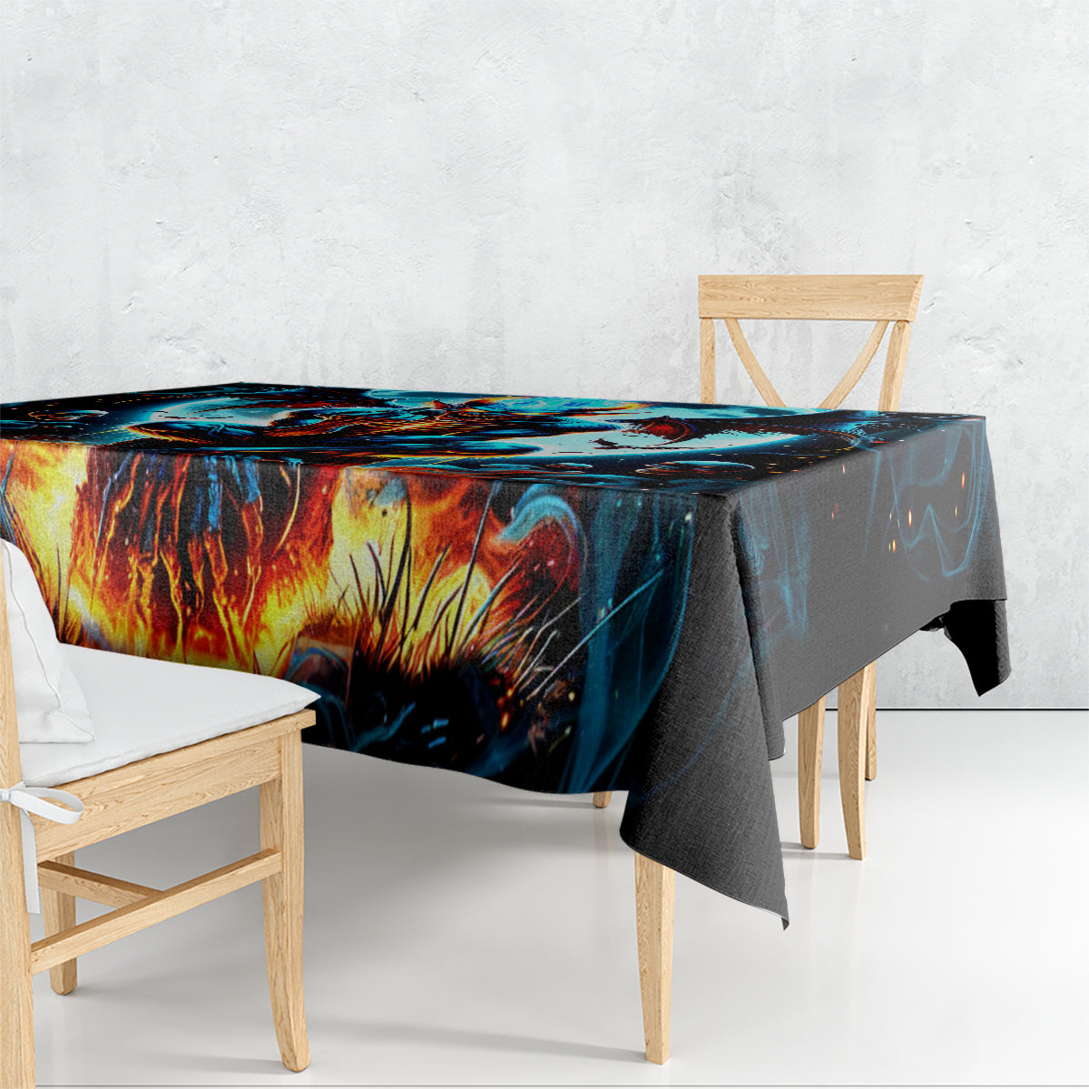 Skull-themed tablecloth with flames and blue demon artwork on dark background