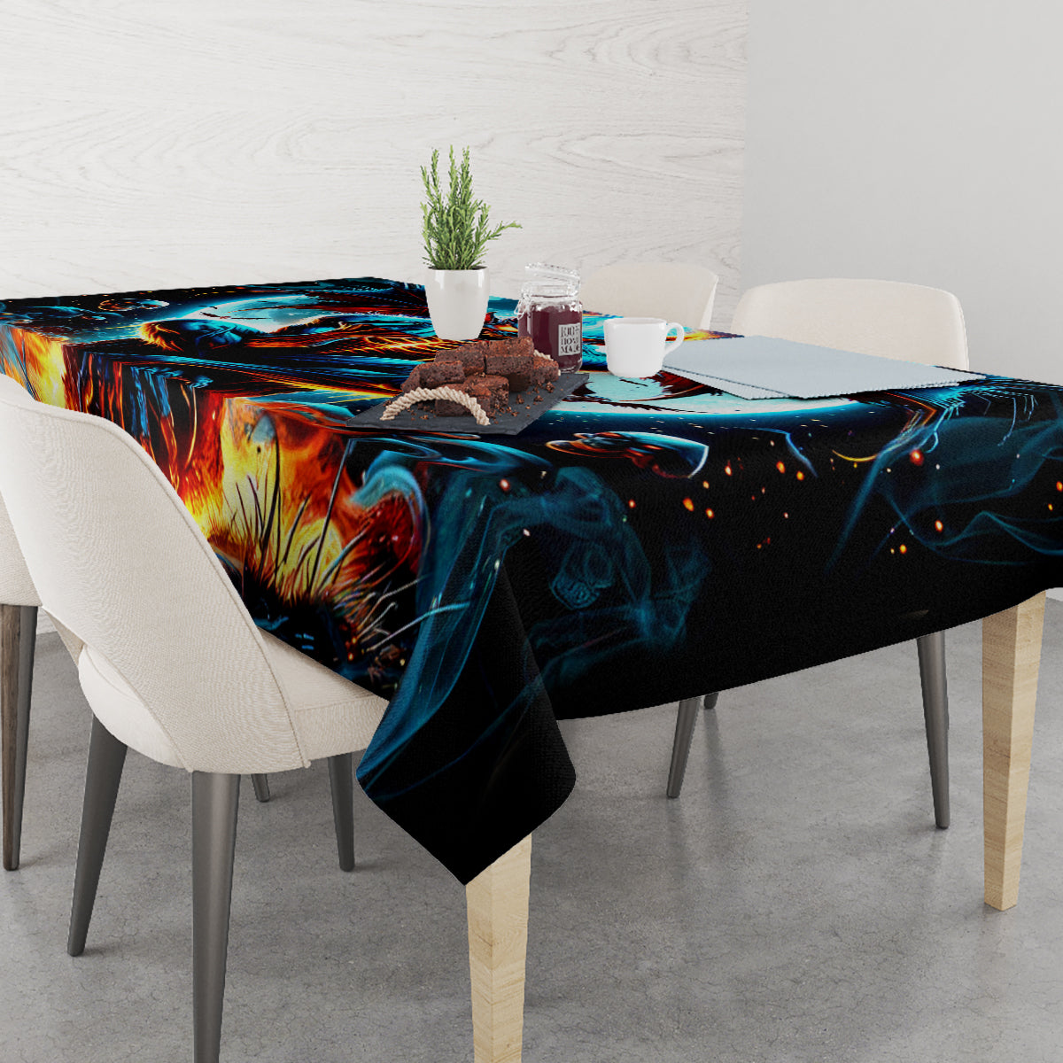 Skull-themed tablecloth draped on table, blue flame demon graphic