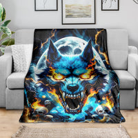 Wolf skull throw blanket draped over a gray sofa, blue flames and skull artwork