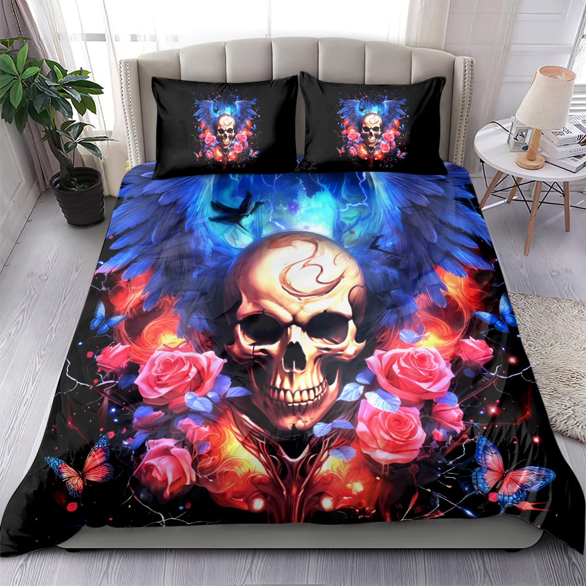 Skull bedding set on bed with two black accent pillows, blue lightning and rose graphics