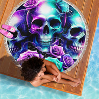 Round fringed beach blanket featuring neon skull with purple roses and teal accents
