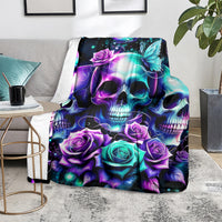 Skull, roses, and butterfly pattern blanket with neon teal and purple coloring