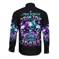 Black long-sleeve button shirt with back skull and rose graphic