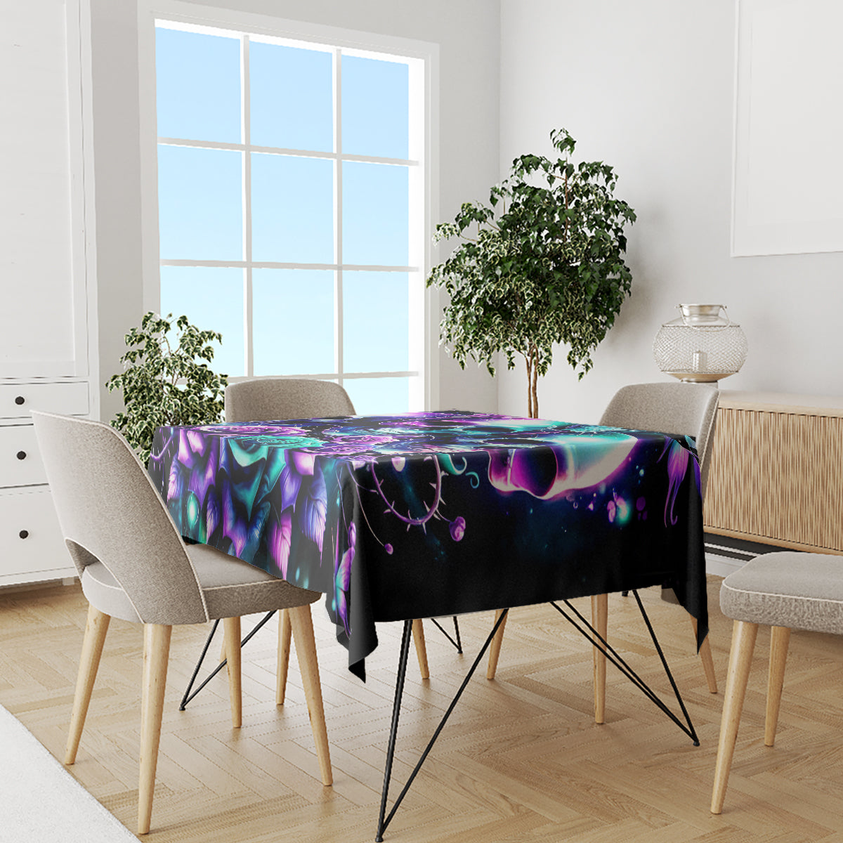 Black skull-and-rose print tablecloth on dining table with matching chairs, purple and teal