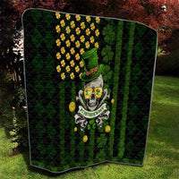 Black and green quilt blanket with shamrock skull graphic, top hat and gold clover details