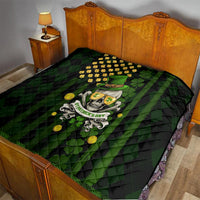 Black and green St. Patrick’s quilt with shamrock skull motif and quilted diamond stitching