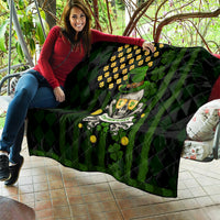 Black and green quilt with shamrock skull print, gold clovers, and diamond-quilt texture