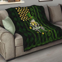 Black and green quilt blanket with shamrock skull centerpiece and diamond quilting on top
