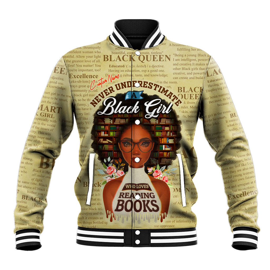 Tan baseball jacket with girl reading-books graphic, striped collar and ribbed hem