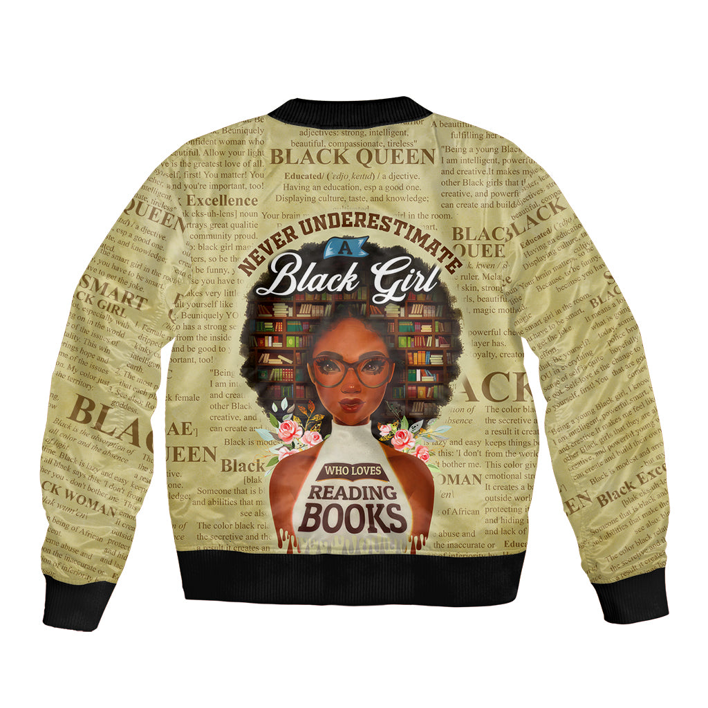 Tan unisex bomber jacket with black rib trim and front zipper, graphic of Black girl reading books