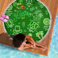 Round neon green St. Patrick's Day beach blanket with fringe and clover heart icons