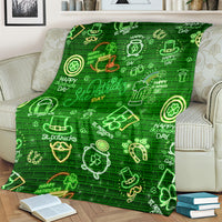 Green St. Patrick's Day blanket draped over sofa with neon clover and horseshoe icons