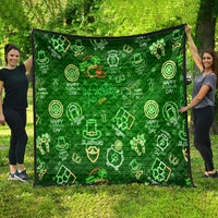 Neon green St. Patrick’s Day quilt spread outdoors, featuring shamrocks and horseshoe icons.