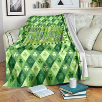Green St. Patrick's Day blanket with shamrock pattern and Happy St. Patrick's Day print