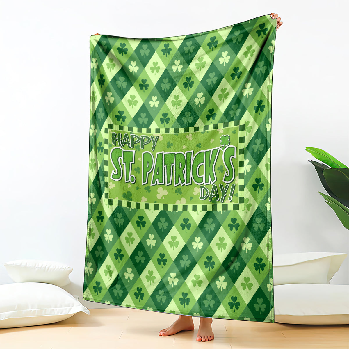 Green St. Patrick's Day throw blanket with diamond shamrock pattern and central Happy text