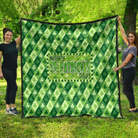 Green St. Patrick's Day throw quilt with shamrock pattern and “Happy St. Patrick's Day” sign.