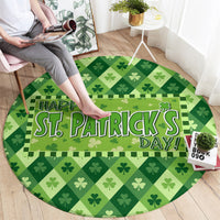 Green round carpet with clover pattern and Happy St. Patrick's Day text on the floor