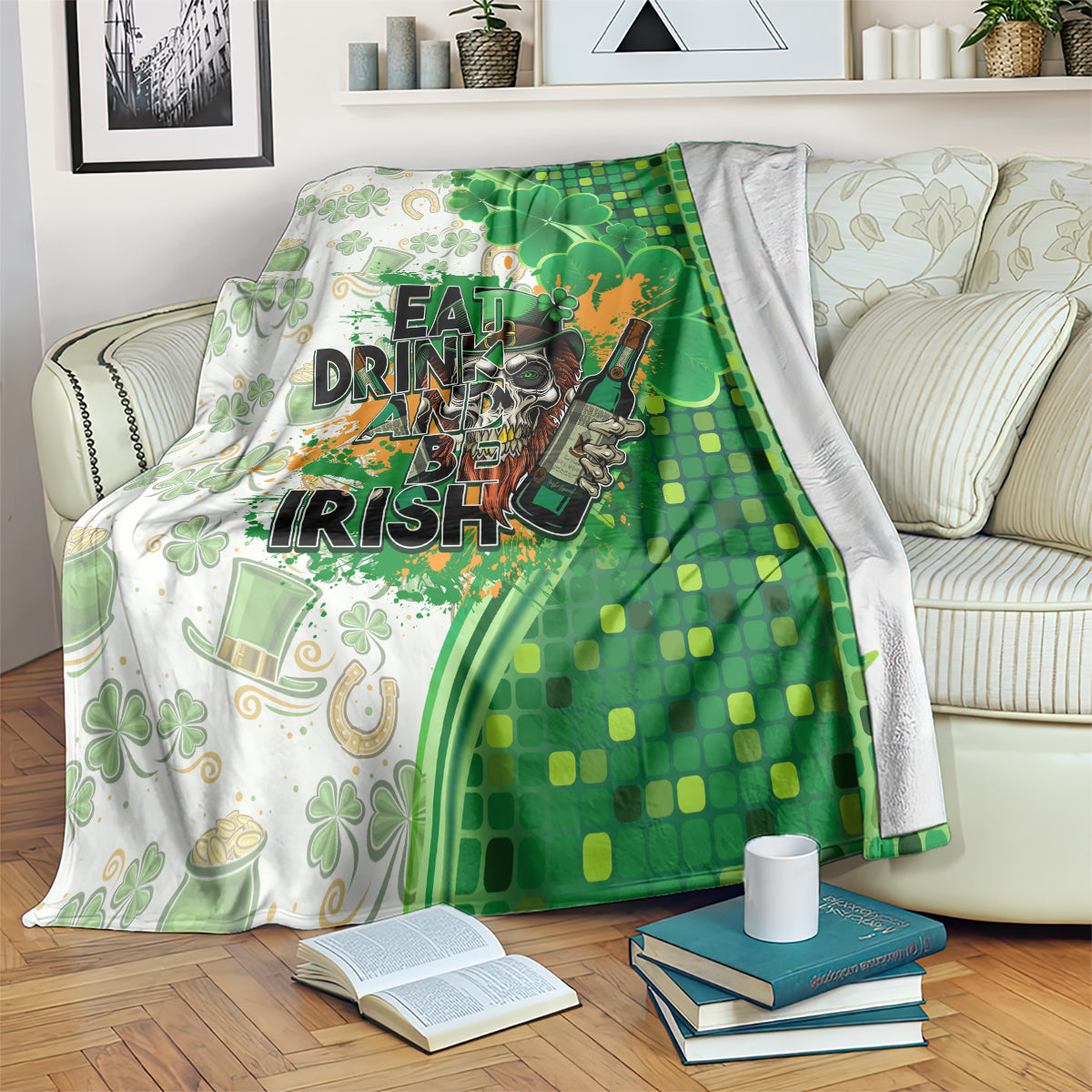 Draped green and white blanket with clovers and Eat Drink and Be Irish text